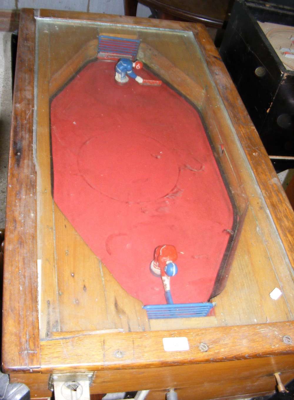 A vintage coin in the slot "Ice Hockey" table game