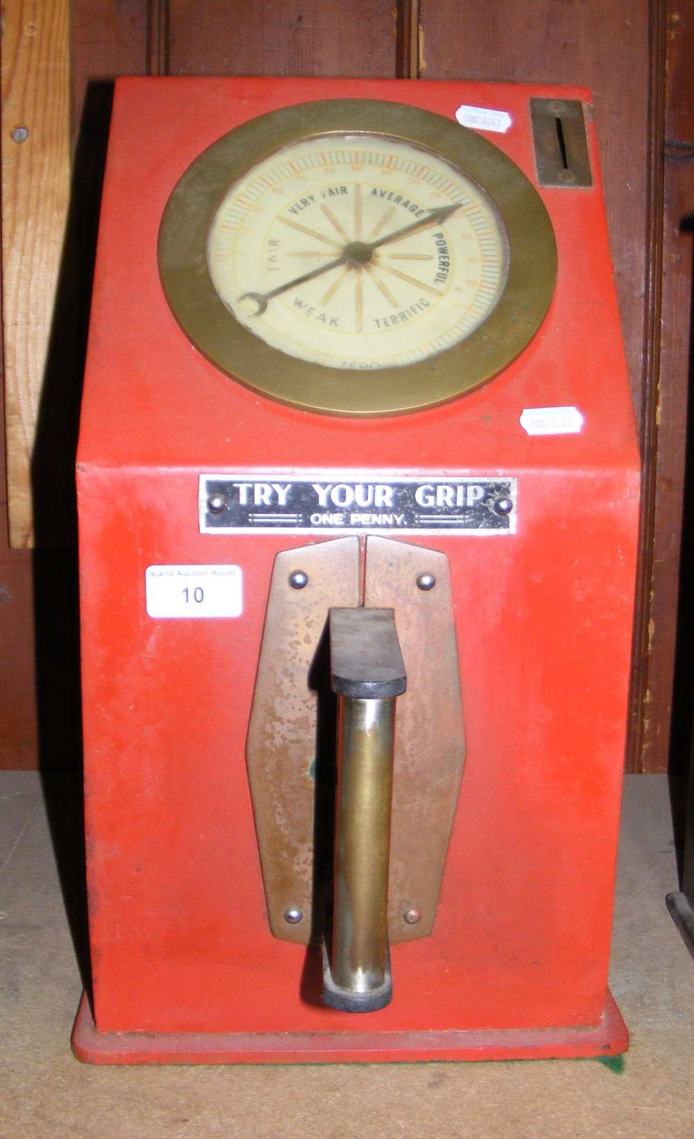 A coin in the slot "Try Your Grip" amusement arcade machine