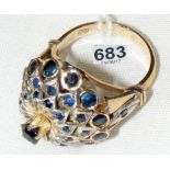 An 18ct gold multiple tiered sapphire dress ring