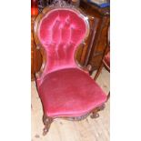 A 19th century button back easy chair with cabriole front supports