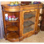 A Victorian inlaid walnut credenza enclosed by glazed centre door