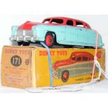A boxed original Dinky Toys No. 171 Hudson Commodore Sedan in red and pale blue