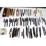A large quantity of assorted collectable fountain pens, etc