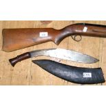 An old air rifle, together with a kukri