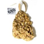 A heavy gold nugget on pendant mount