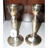 A pair of 18cm high silver candlesticks - Birmingham hallmark