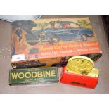 A vintage Remote Control Battery Operated tinplate model Police Car in original box, Wills's