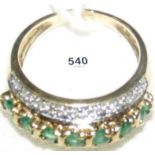 A 9ct gold emerald and diamond half-hoop eternity ring