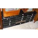 A painted pine multi-drawer chest