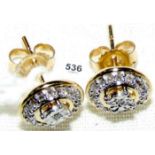 Pair of 9ct gold set diamond cluster stud earrings