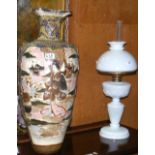 A Victorian milk glass oil lamp and a Satsuma floral vase