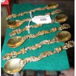 A set of six highly decorative silver gilt spoons