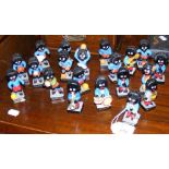 Twelve football and eight band hand painted Robertson Jam pottery Golliwogs