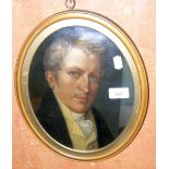 An oval oil on canvas under glass head and shoulders portrait of a gentleman - 28cm high