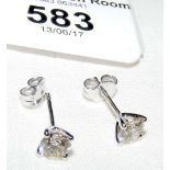 Pair of 18ct gold single stone diamond stud earrings - approximately 1.1 carat total diamond weight