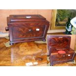 A 30cm sarcophagus shape mahogany two compartment tea caddy