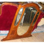 An Edwardian inlaid mahogany triple bevelled mirrored over mantel