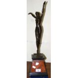 A bronze figure of a semi-nude lady dancing in the Art Deco style - 57cm high