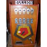 A Bullion coin in the slot amusement arcade gambling machine