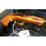 A replica Derringer percussion pistol made by Jukar of Spain