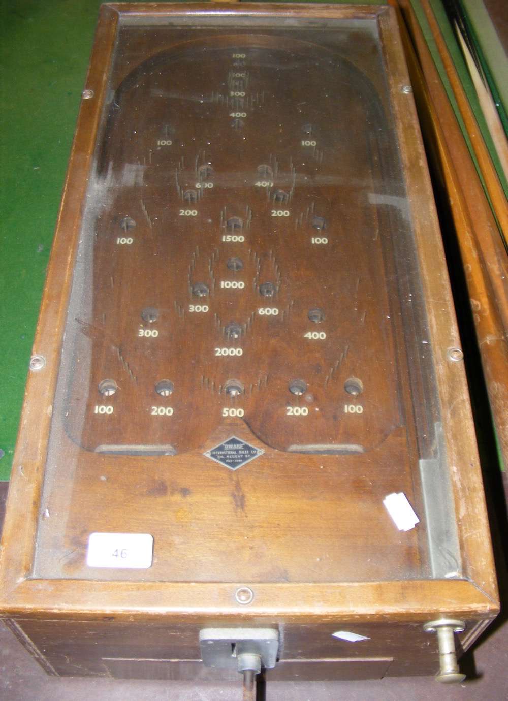 A coin operated table-top "Dwarf" Bagatelle Table