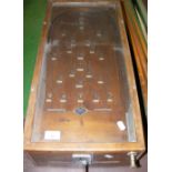 A coin operated table-top "Dwarf" Bagatelle Table