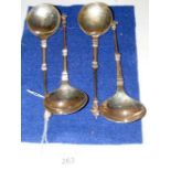 Four long silver Dutch apostle spoons