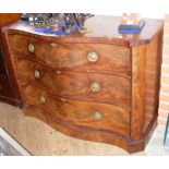 A 19th century mahogany serpentine fronted chest of three long drawers - 130cm