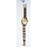 A 9ct gold gent's Longines wrist watch with 9ct gold strap