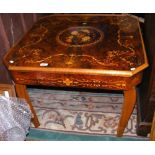 A decorative inlaid Italian coffee table