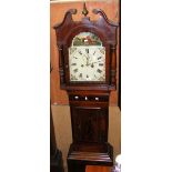 A 19th century mahogany eight day Grandfather clock with painted arched dial