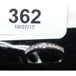 A 9ct gold diamond eternity ring