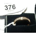 A Princess cut diamond eternity ring (approx. .7 carat total) in 18ct gold setting