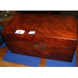 A Victorian mahogany tea caddy with fitted interior