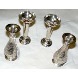 Pair of silver vases and one other