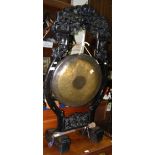 A Chinese hardwood dinner gong - 130cm high