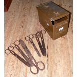 Antique scissors in ammunition case