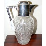 A cut glass lidded ewer with plated mount and handle by Hukin & Heath - 20cm