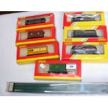 Seven boxed Hornby rolling stock