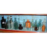 Various collectable antique bottles, including Mew & Co., Isle of Wight and others