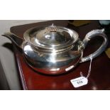 A silver teapot by Goldsmiths Company, London