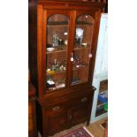 Victorian bookcase with glazed upper section, drawers and cupboards below