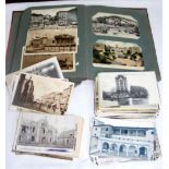 Album containing vintage postcards from France, together with loose cards