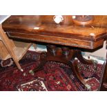 A Regency rosewood fold-over games table