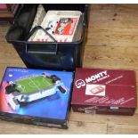 Various boxed games, including "Computacar"