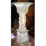 Stone garden urn on decorative cherub plinth - standing 168cm high