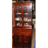 A secretaire bookcase with fitted interior