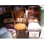 Three antique rush seated chairs and two others