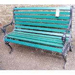 Wrought iron and wooden garden bench
