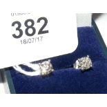 A pair of diamond Solitaire earrings (1.1 carat total) in 18ct gold setting